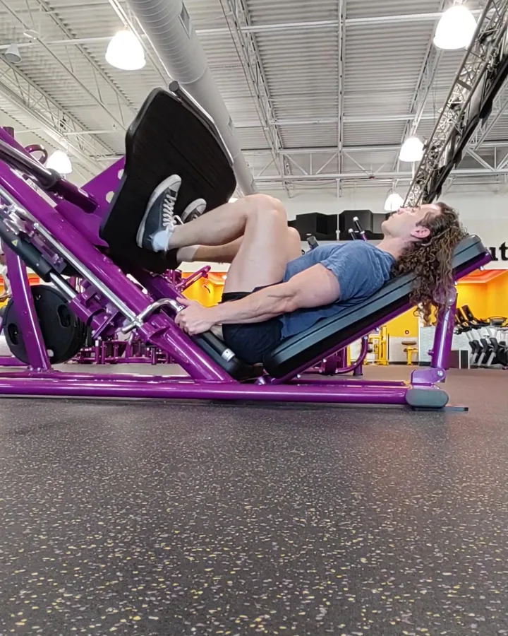 Nick training on a leg press machine