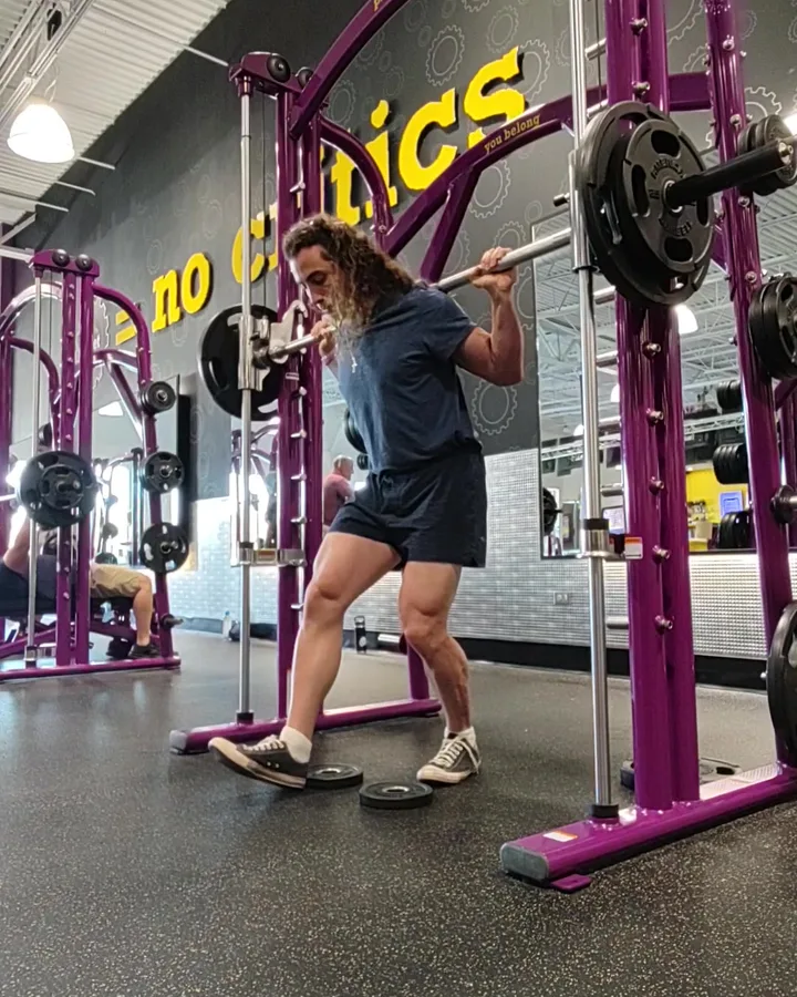 Nick squatting in a Smith machine